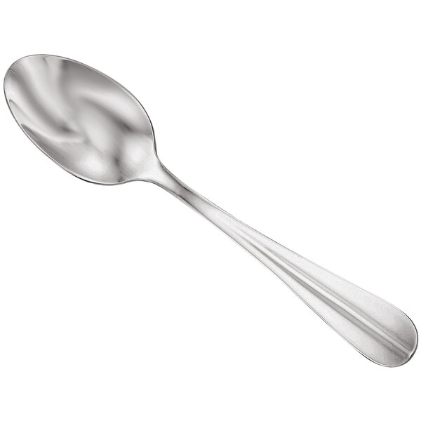 A Walco Parisian stainless steel dessert spoon with a silver handle.