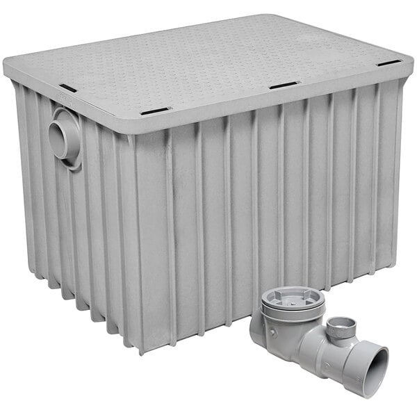 A grey rectangular Endura grease trap with 3" threaded connections and a drain.