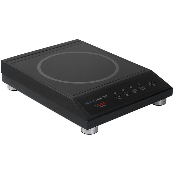 A black Spring USA induction warmer with buttons on a counter.