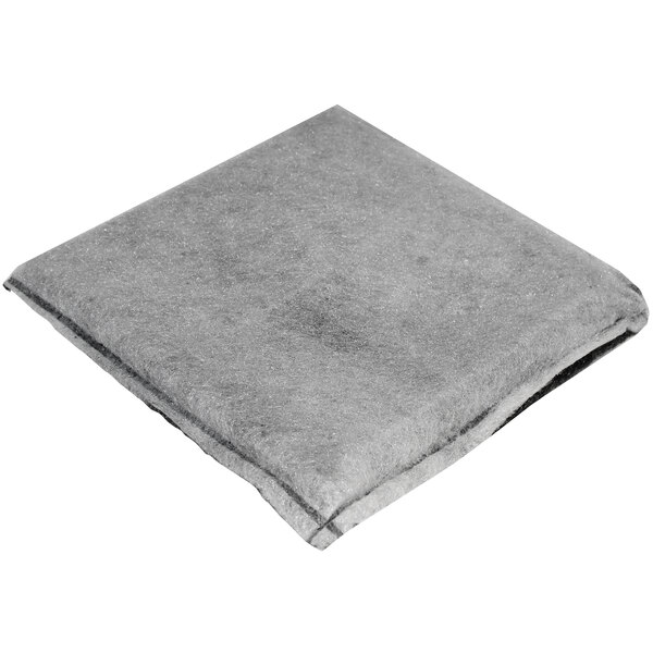 A grey square carbon filter.