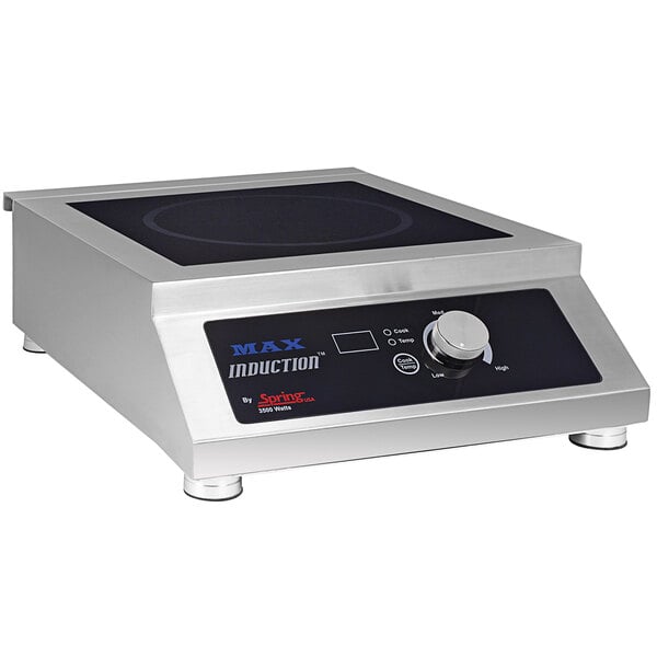 A Spring USA stainless steel countertop induction range with a black surface and a knob.