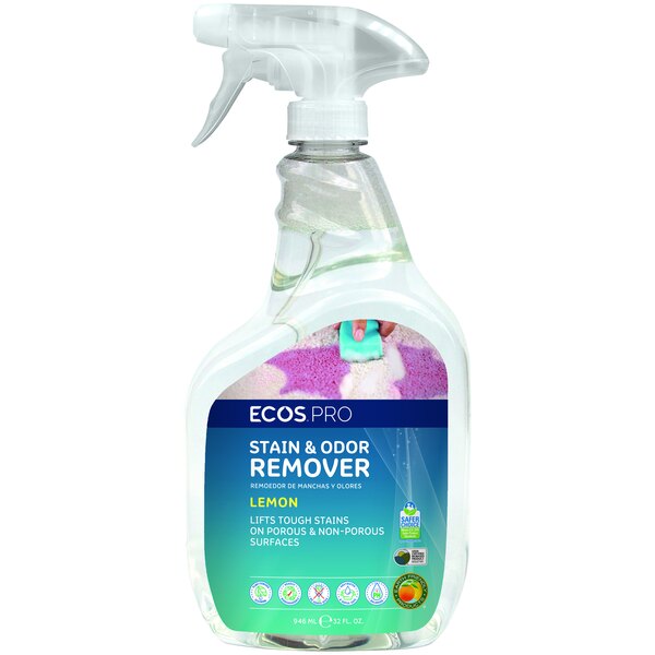 A close-up of a ECOS Pro lemon-scented stain and odor remover spray bottle with a label.