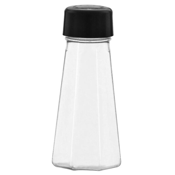 A clear glass salt shaker with a black lid.