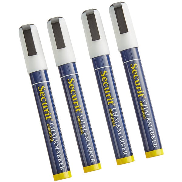 A group of American Metalcraft Securit chalk markers with white caps. Three of the markers have yellow and black writing on them.