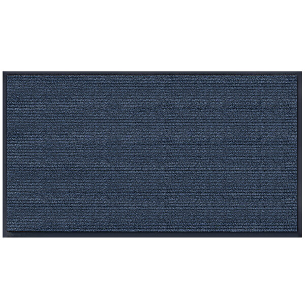 A close-up of a navy blue rectangular carpet with a black border.