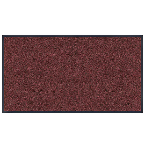A red Lavex Plush Dilour entrance mat with black trim.