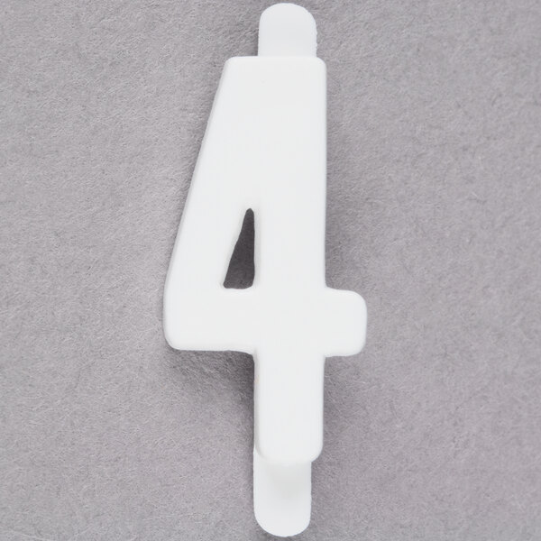 A white molded plastic number 4 deli tag insert.