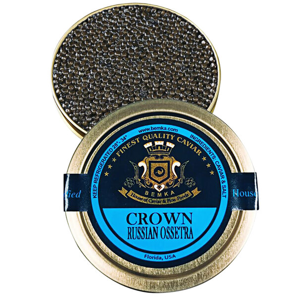 A round metal tin of Bemka Crown Russian Ossetra Sturgeon Caviar with a blue label.