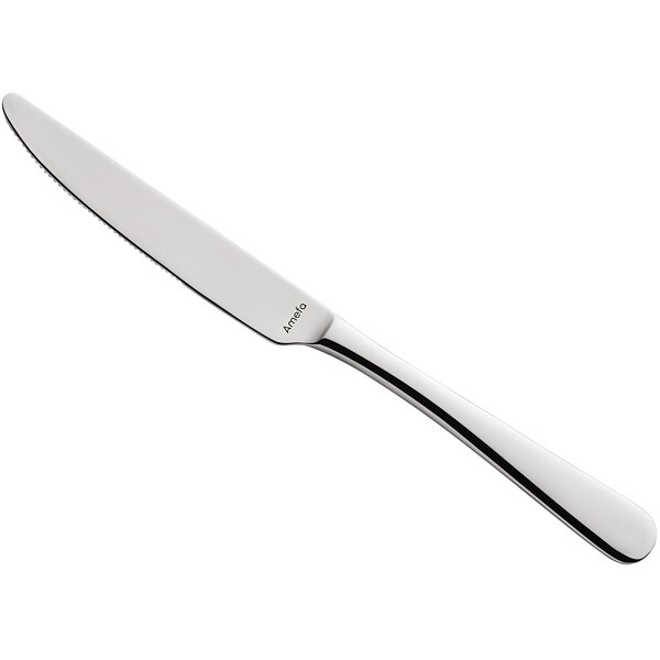 An Amefa stainless steel table knife with a silver handle.