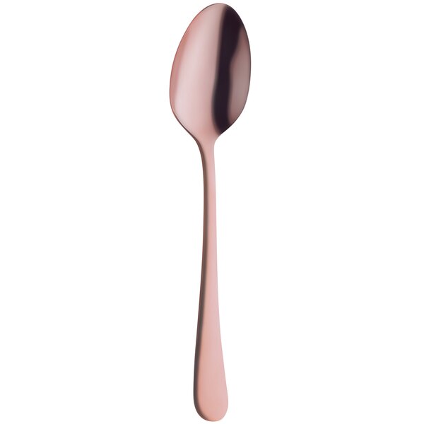 An Amefa Austin stainless steel serving spoon with a rose gold handle.