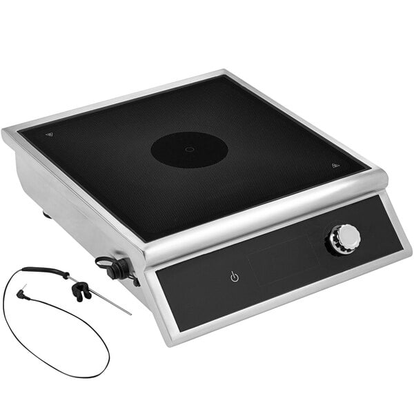 A stainless steel Vollrath 4-series induction range on a countertop.