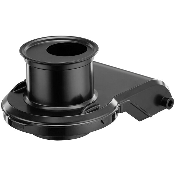 A black plastic lid for a Waring juice extractor with a hole in the center.