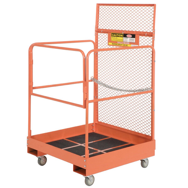 An orange metal forklift maintenance platform with guard rails.