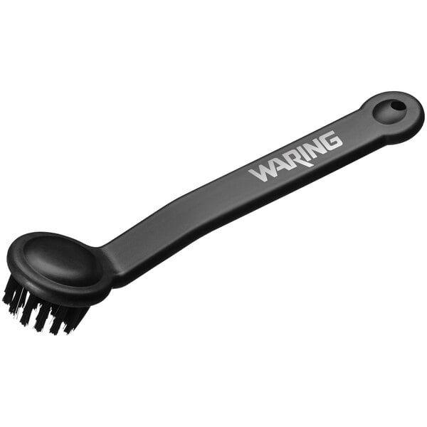 A black brush with a Waring black handle.