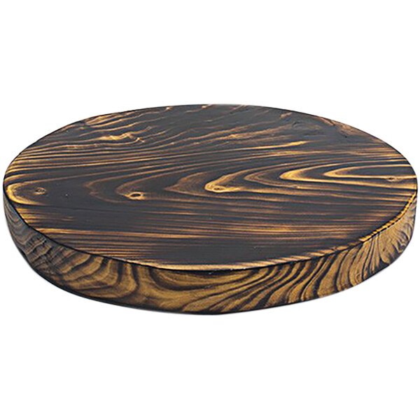 A Front of the House ROOT round wooden serving board.