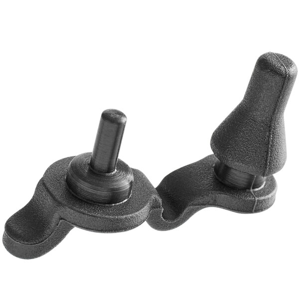A close up of two black plastic knobs.