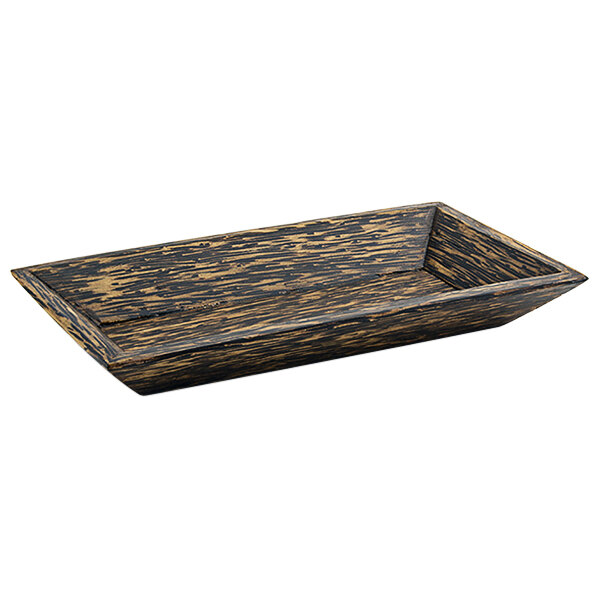 A rectangular Front of the House palm wood plate with brown stripes on a table.