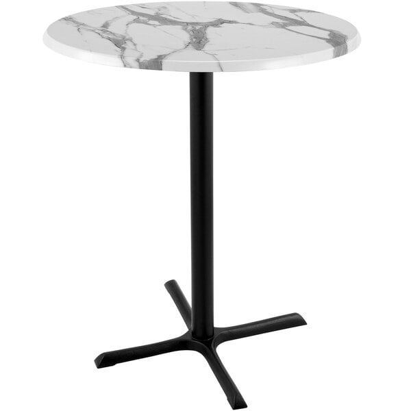 A white marble round Holland Bar Height table with a black cross base.
