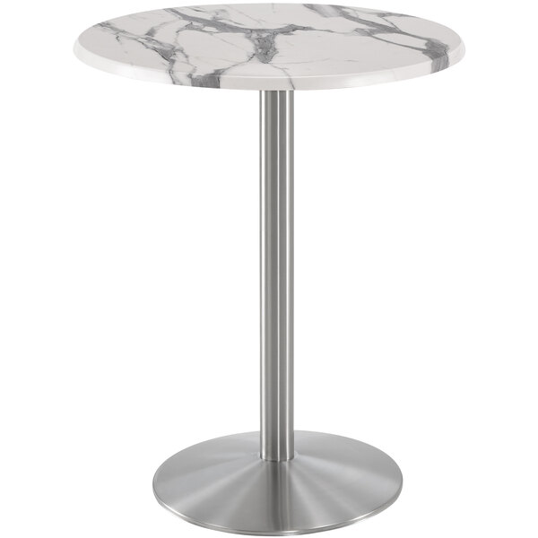 A Holland Bar Stool white marble round bar height table with stainless steel round base.