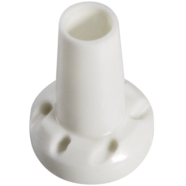 A white plastic round nozzle with holes.