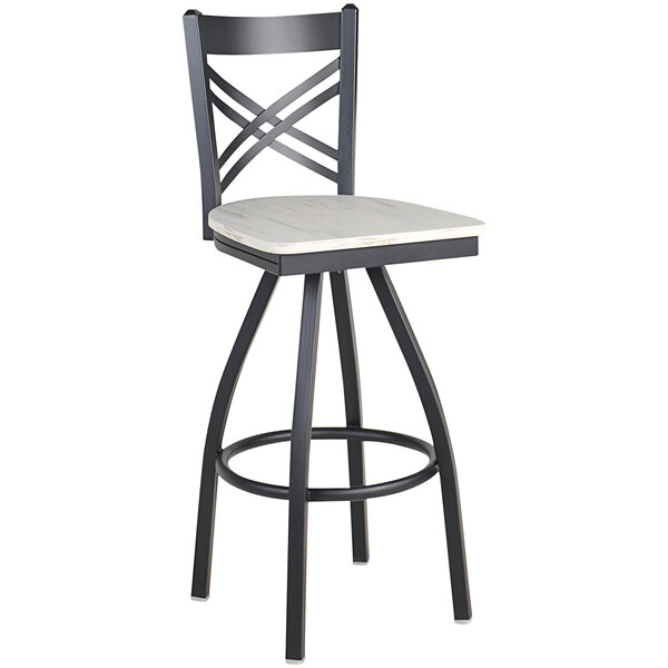 A black steel cross back barstool with a white swivel seat.