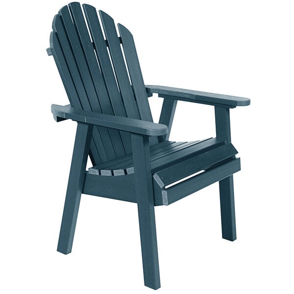A Nantucket Blue faux wood Adirondack chair with arms.