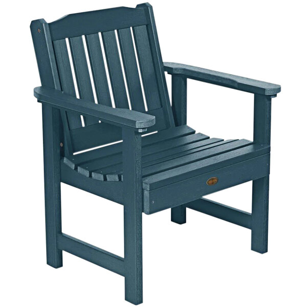 A Nantucket blue faux wood outdoor arm chair with Sequoia armrests.