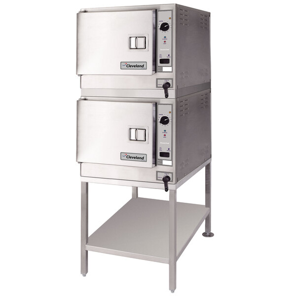 A Cleveland SteamChef 3 double deck floor steamer with two large stainless steel ovens.