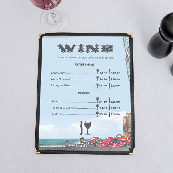 8 1/2" x 11" seafood themed menu paper with a wine menu holder and a glass of wine on a white surface.