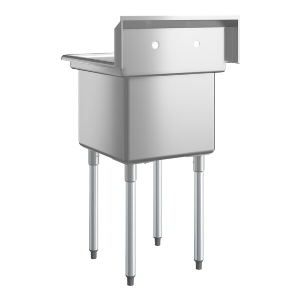 A stainless steel commercial sink with four metal legs and a deep rectangular basin, featuring a backsplash with two faucet holes.