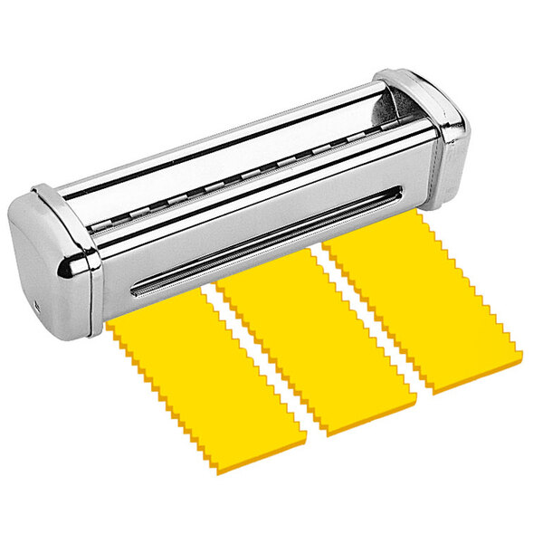 A close up of the metal Imperia Reginette pasta cutter attachment with four yellow pasta sheets.