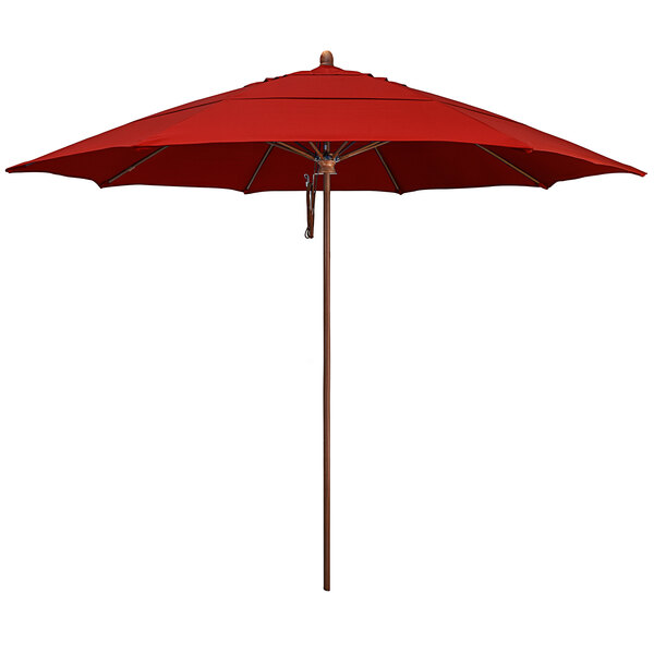 A close-up of a California Umbrella with a red Sunbrella canopy and wood pole.