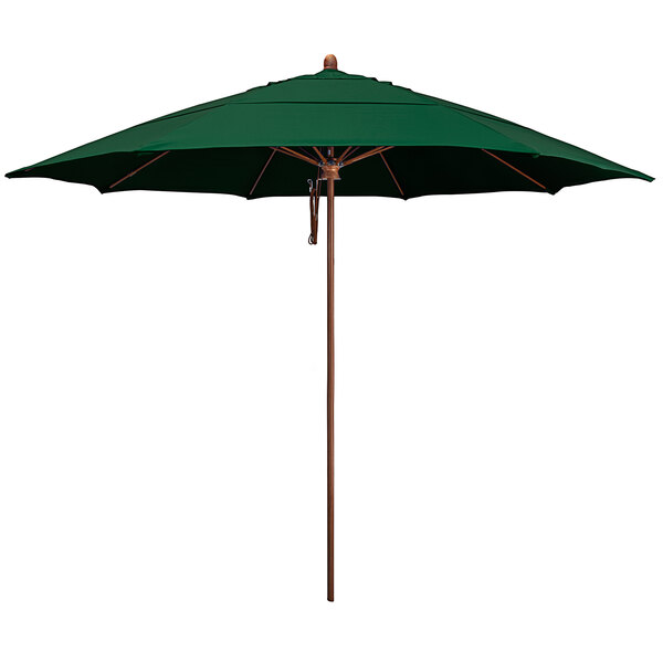 A California Umbrella with a green Sunbrella canopy and a wood-like aluminum pole.