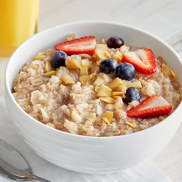 A bowl of Bob's Red Mill 5-Grain Rolled Cereal with fruit.