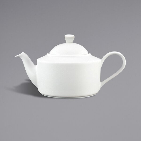 A close-up of a Fortessa Ilona white teapot with a lid.