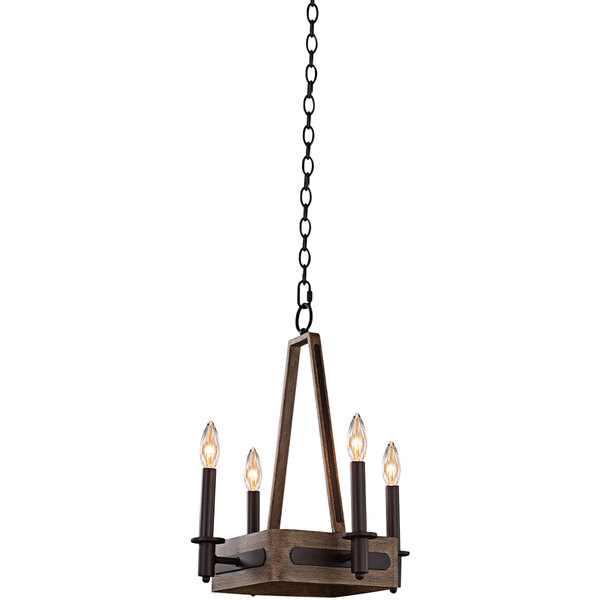 A Kalco Duluth chandelier with a satin bronze finish and four square lights over a restaurant dining table.