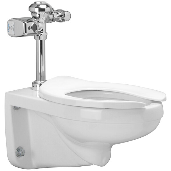 A Zurn floor mounted toilet with a silver flush valve.