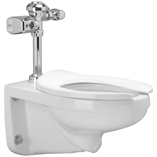 A white Zurn wall hung toilet with a silver sensor flush valve.