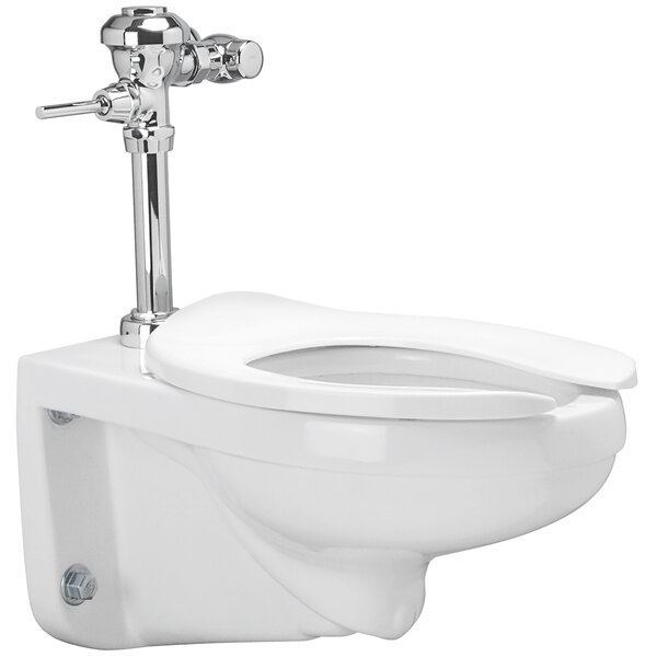 A white Zurn floor mounted toilet with chrome flush valve.