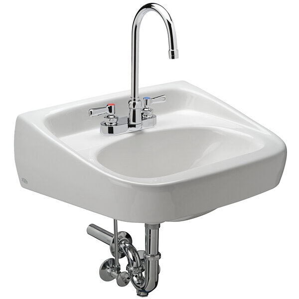 A white wall hung lavatory sink with a Zurn manual faucet.
