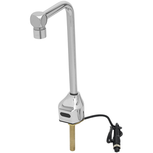 A T&S chrome deck mount glass filler faucet with a power cord attached.
