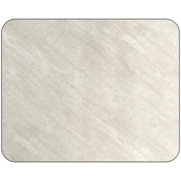 A close-up of a white surface on a Lancaster Table & Seating rectangular table top with gray slate on the other side.
