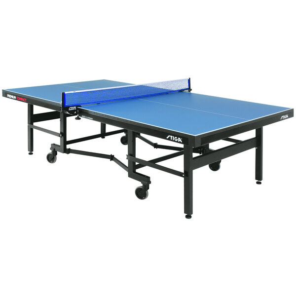 A blue Stiga ping pong table with a black base and a net.