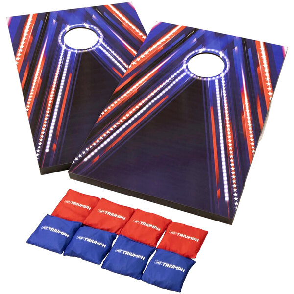 Triumph patriotic LED cornhole set with blue and red lights on the boards.