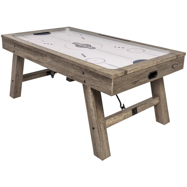 An American Legend Brookdale air hockey table with a white surface.