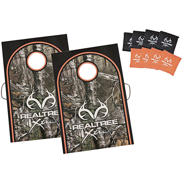 A pair of Triumph cornhole bags with a RealTree deer head logo.