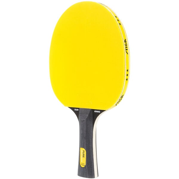 A yellow Stiga ping pong paddle with a black handle.