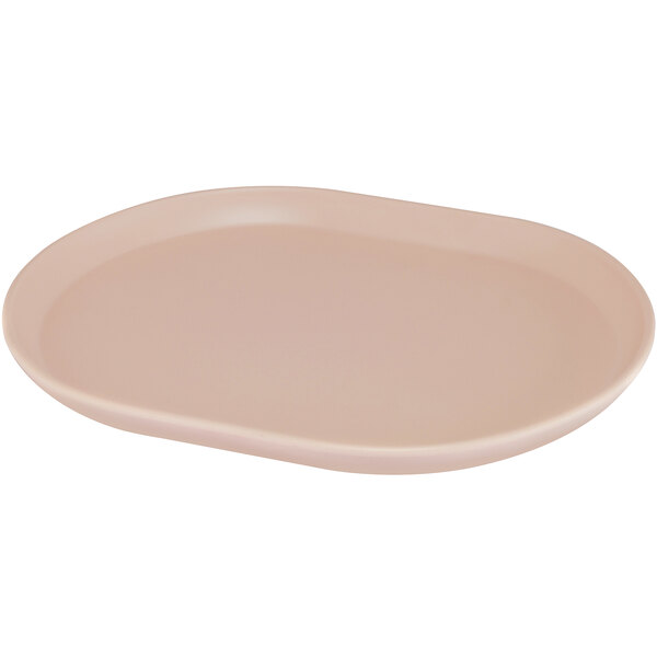 A Cal-Mil blush melamine oval tray with raised rim and a pink oval plate.