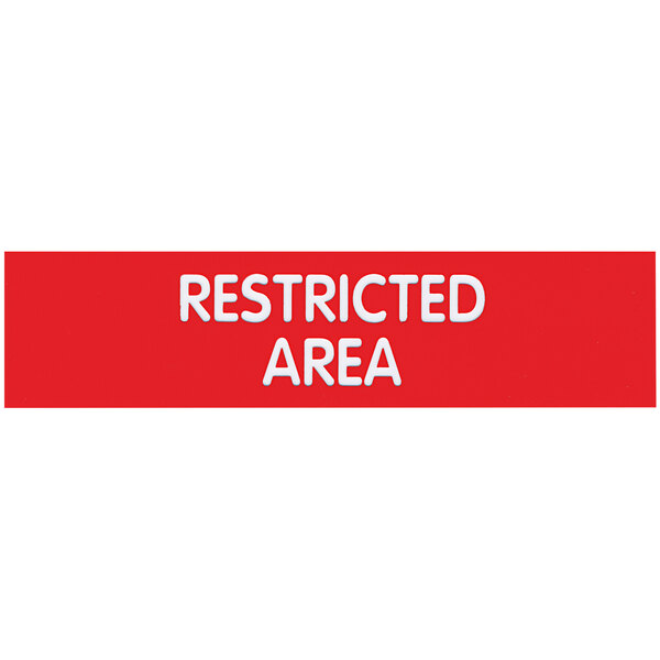 A red rectangular sign with white text that says "Restricted Area"