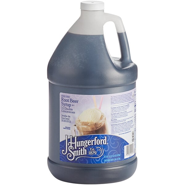 A large plastic jug of J. Hungerford Smith Root Beer concentrate with a white cap and label.